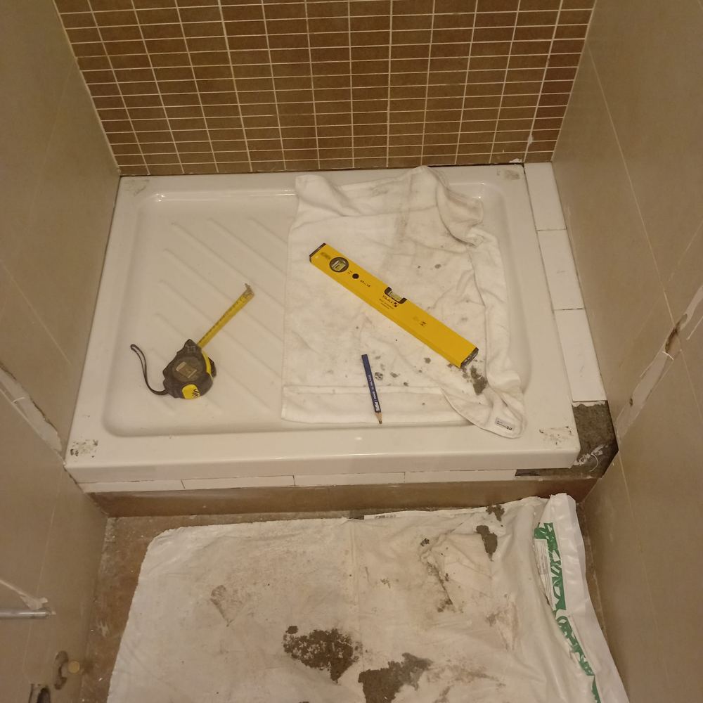 Posa piatto doccia